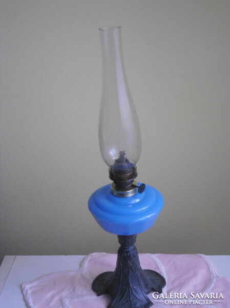 Art Nouveau table petroleum lamp with an old spaiater base