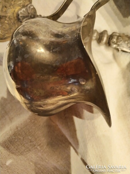 Silver-plated jug, spout - in an antique atmosphere