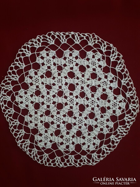 Crochet lace tablecloth with a geometric pattern
