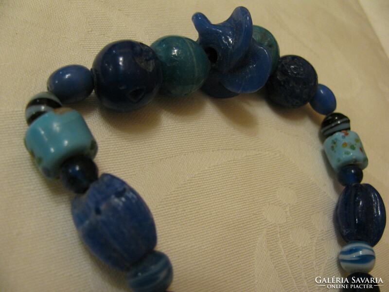 Spectacular necklaces made of special sea blue stones and pearls