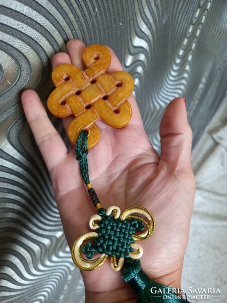 Original jade Tibetan knot with carved motifs