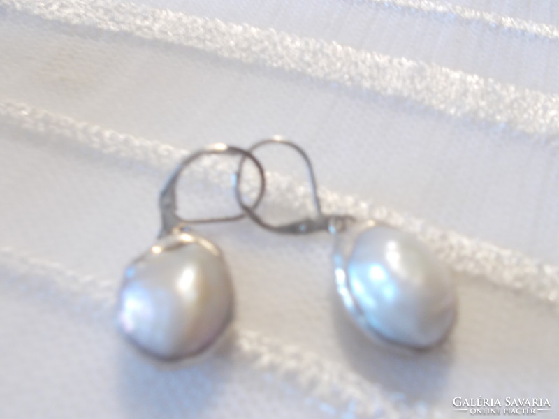 Busy biwa earrings with cultured pearls are rounder