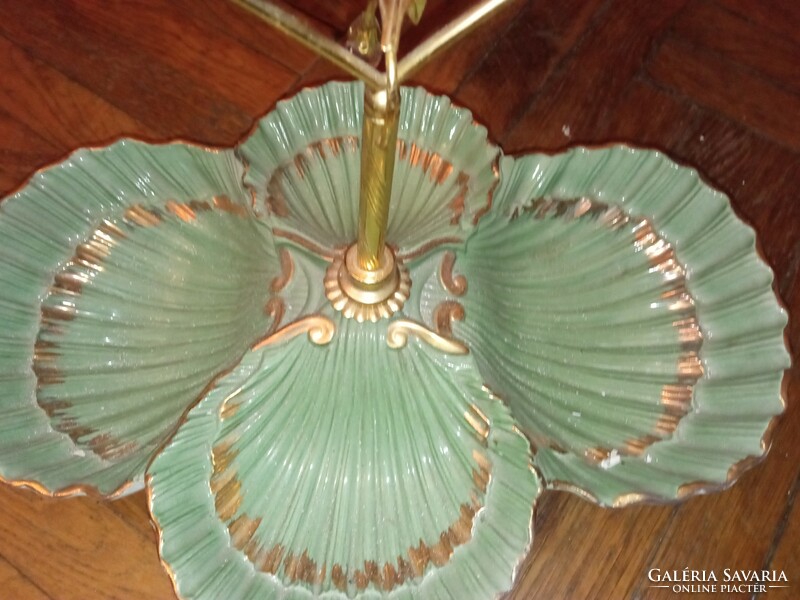 A beautiful shell-shaped tray with a special crystal decorated handle