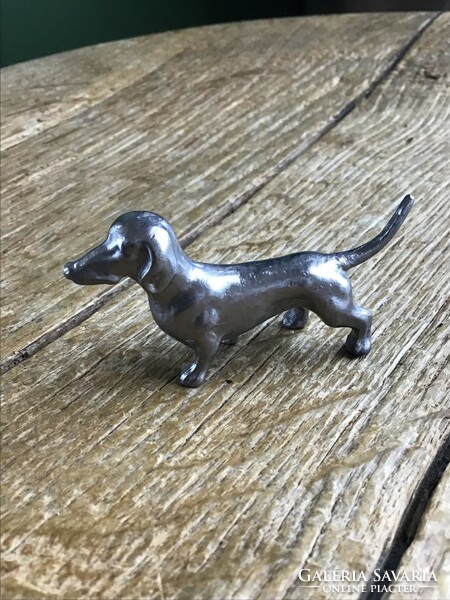 Old tin dachshund dog figure