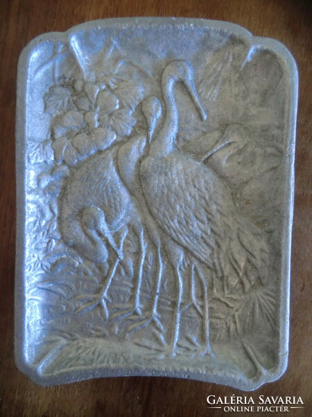 Decorative cast metal stork family 14x19 on the back as a keepsake