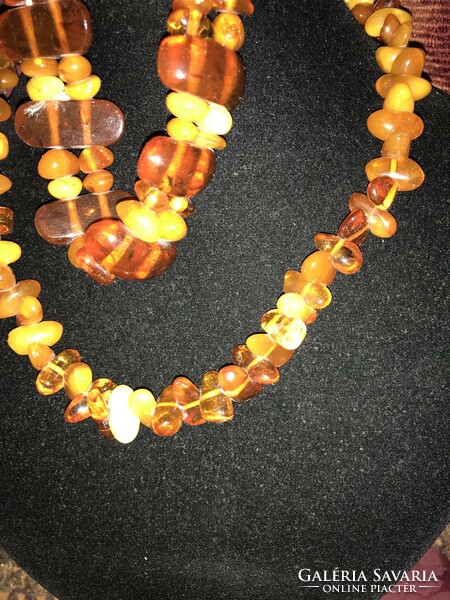 Beautiful multi-colored Baltic amber with polished eyes and matching bracelet