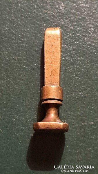 Antique monogrammed copper stamp press