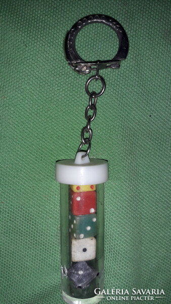 Retro traffic plastic cylinder with small plastic colored dice inside, key holder according to the pictures 2.