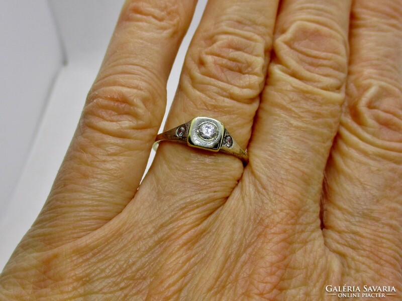 Beautiful antique gold ring with white stones in a button setting