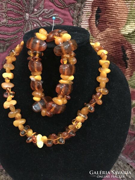 Beautiful multi-colored Baltic amber with polished eyes and matching bracelet