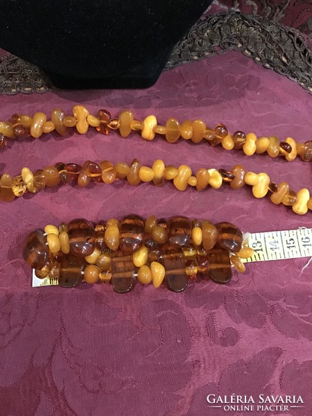 Beautiful multi-colored Baltic amber with polished eyes and matching bracelet