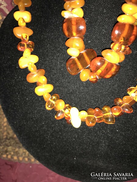 Beautiful multi-colored Baltic amber with polished eyes and matching bracelet