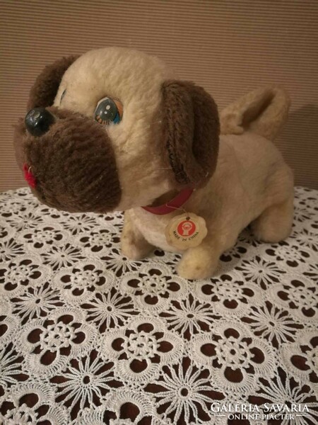 Old rechargeable plush dog