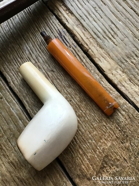 Antique tajték pipe with amber tip in its case