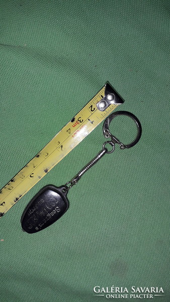 Retro advertising seagram's 100 pipers deluxe scotch whiskey key ring as shown in the pictures