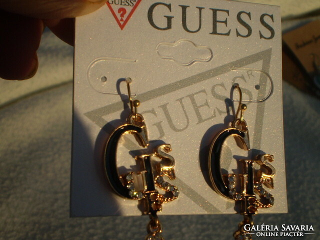 Duplicate earrings with Guess brand logo