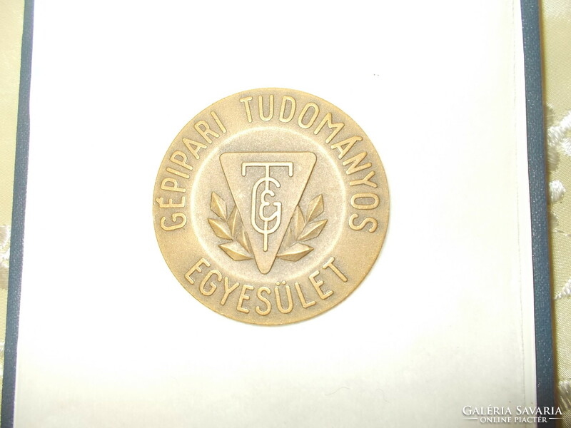 Old bronze plaque medal for technology development 1986