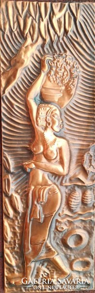 Old copper relief mural