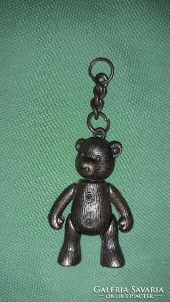 Old copper moving teddy bear keychain figure according to the pictures