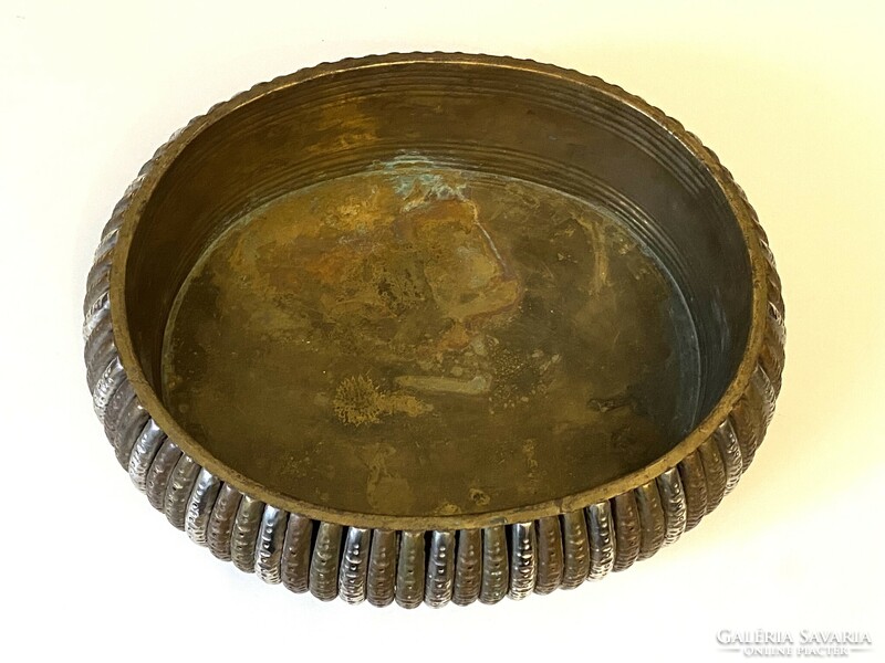 Made of copper, decorated with silver-colored metal, with ribbed edges, an oval table-top metal serving bowl, a flower pot