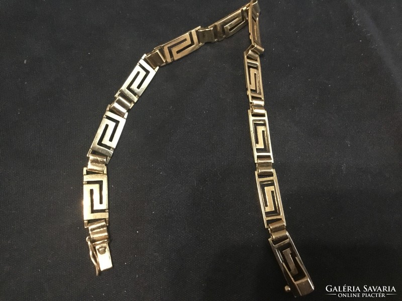 Gold women's bracelet