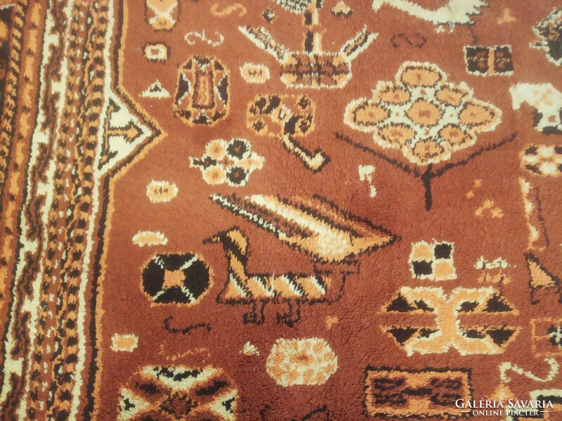 Caucasian patterned carpet with animal figures