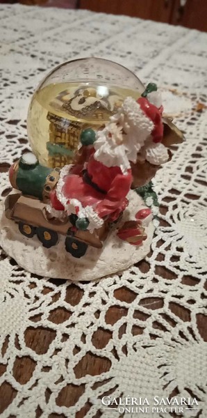 Cute Christmas snow globe with Santa Claus decoration made of polyresin for the village
