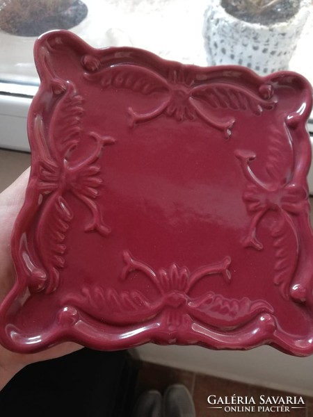 Burgundy ornate ceramic centerpiece