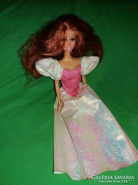 Very beautiful barbie-like doll with lush red hair in a princess dress, size 8 according to the pictures.