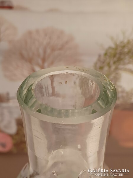 Old engraved crystal liqueur glass with a well-closing stopper