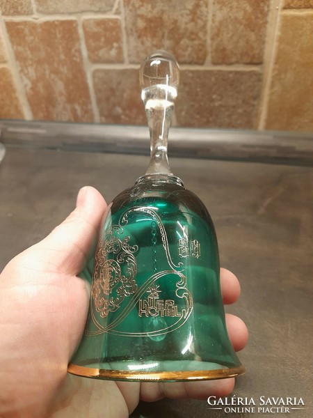 Green gold glass bell souvenir with inter hotel inscription