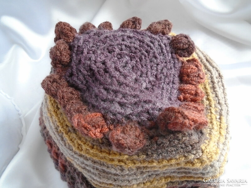 Handmade hat crocheted in several shades of brown.