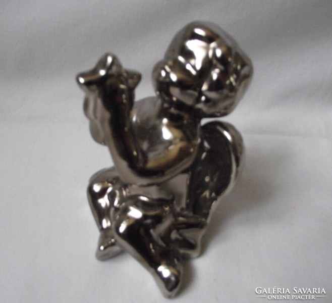 Silver colored angel, putto, Christmas table decoration, star