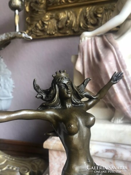 Female act with globe - bronze sculpture