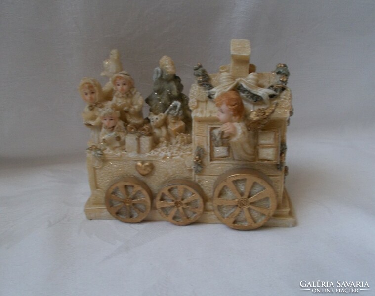 Christmas table decoration (train, putto, singing choir)