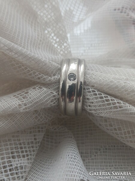 Women's hoop silver ring with a small stone