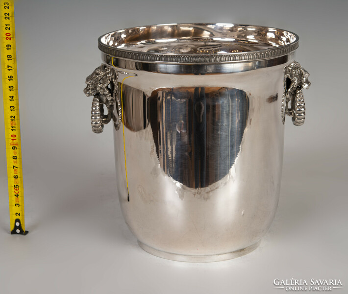 Silver champagne bucket with plastic lion heads
