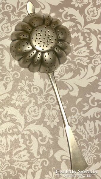 Large silver-plated tea strainer
