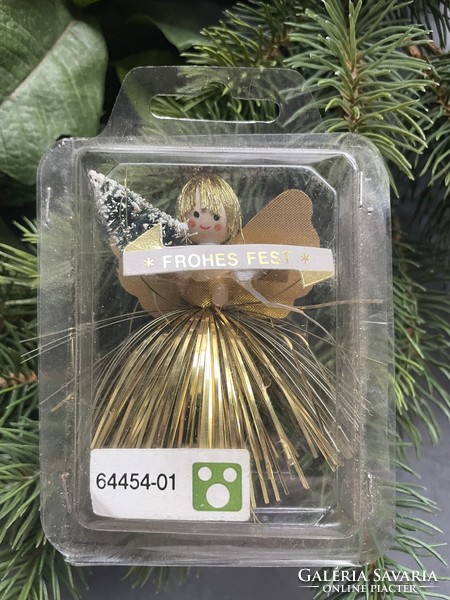 Angel girl in gold dress Christmas tree decoration - holding Christmas tree