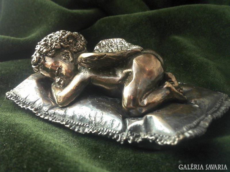 Resting angel bronze statue