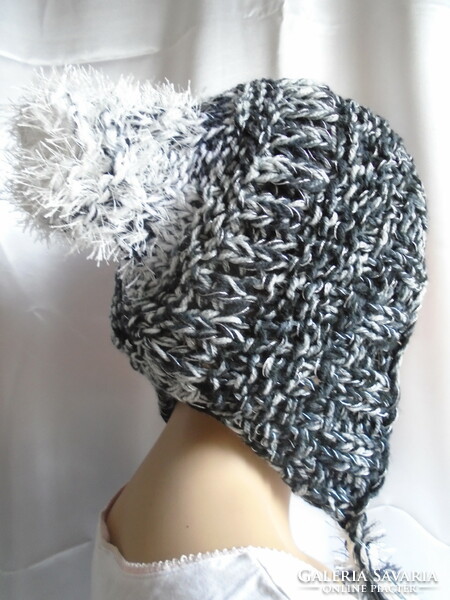 Handmade knitted hat with 2 tassels.
