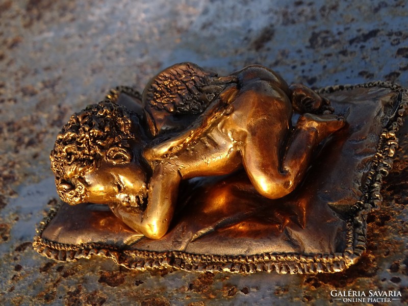 Resting angel bronze statue