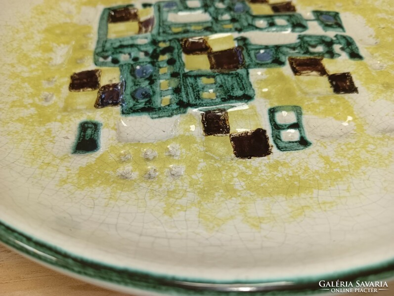 Ceramic plate with an abstract pattern