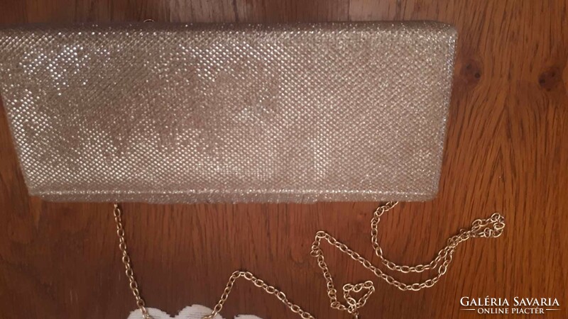 Gold-colored, two-drawer, gold-colored long chain, unused, bought very cheaply abroad
