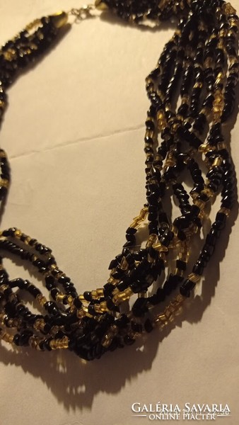 art deco? Multi-row women's necklace, very old jewelry strung with gold and black glass eyes