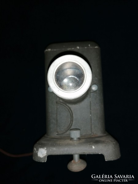 Slide projector, proton