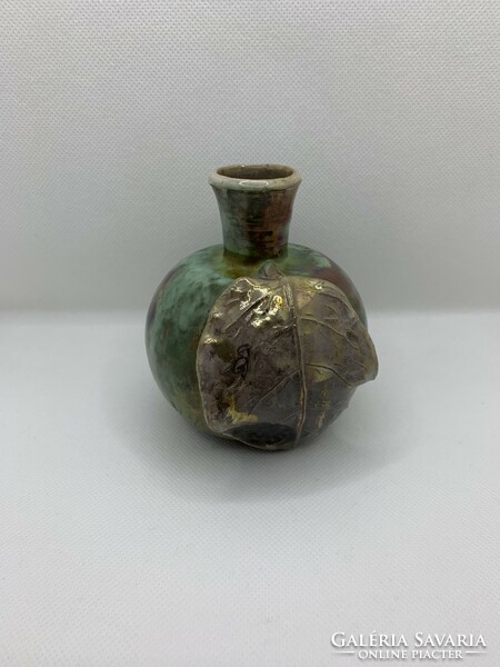 Ceramic vase with leaves by Zsuzsa Füzesi