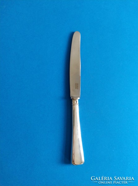 Silver main course knife