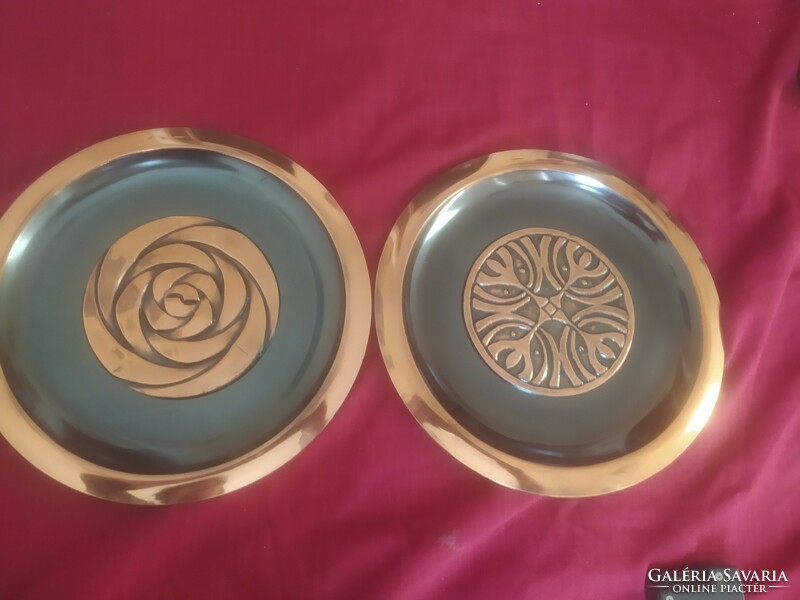 A pair of juried copper wall plates by an applied arts company