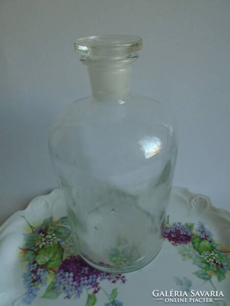 A large, corked apothecary bottle. 25.6 cm high.